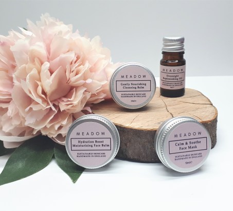 All on Log Slice with Pink Flower