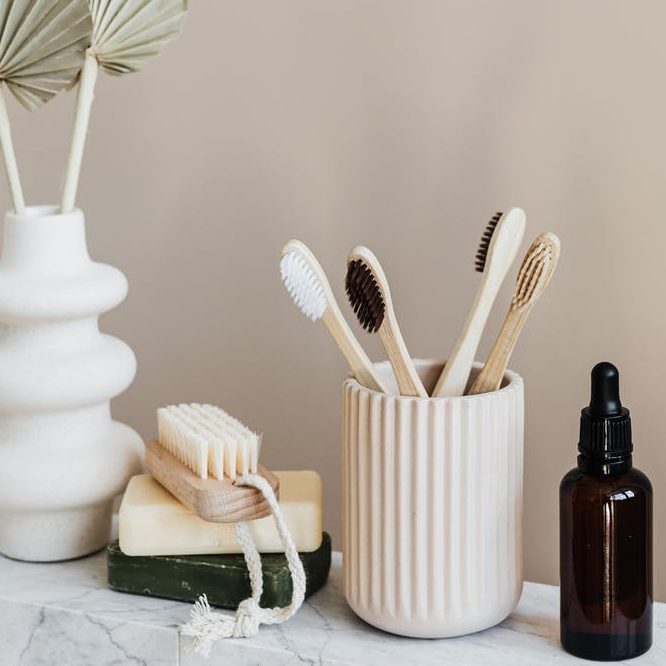 Plastic free beauty items on a marble sideboard. A Plastic Free Green Beauty Guide by Beauty Folio highlighting plastic pollution and plastic free beauty from Lovethical.