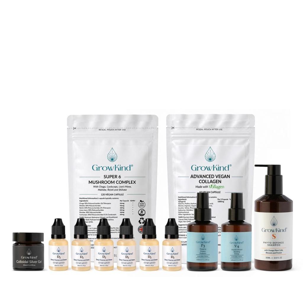 A collection of GrowKind health products, including Super 6 Mushroom Complex, Advanced Vegan Collagen, and various dropper bottles with vitamins, alongside a jar of Colloidal Silver Gel and a bottle of Phyto Defence Shampoo.